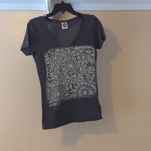 Gray short sleeve T-shirt.
